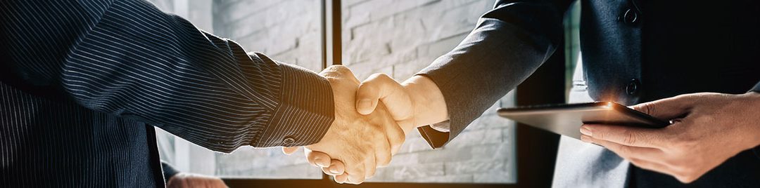 businessmen talking about shareholders agreement