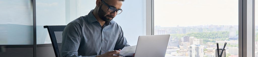businessman reading about Division 7A Loan